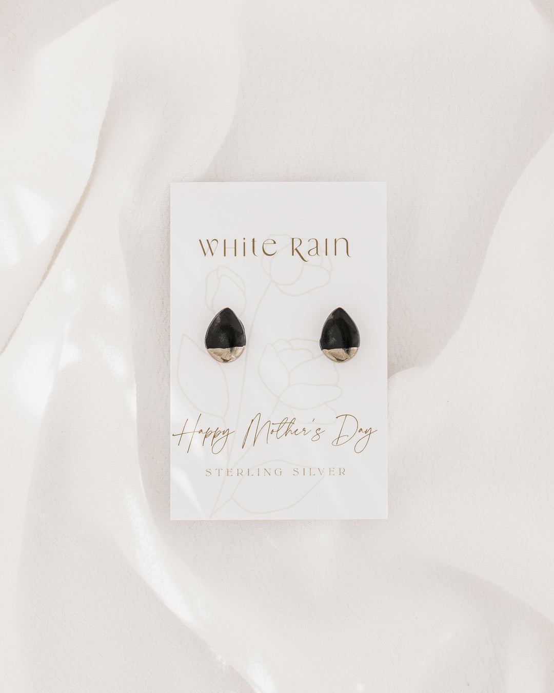 Ceramic stud earrings with platinum lustre on a Happy Mother's Day earring card